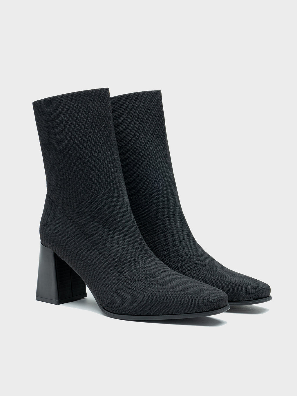 Botas com textura de tricô e salto quadrado