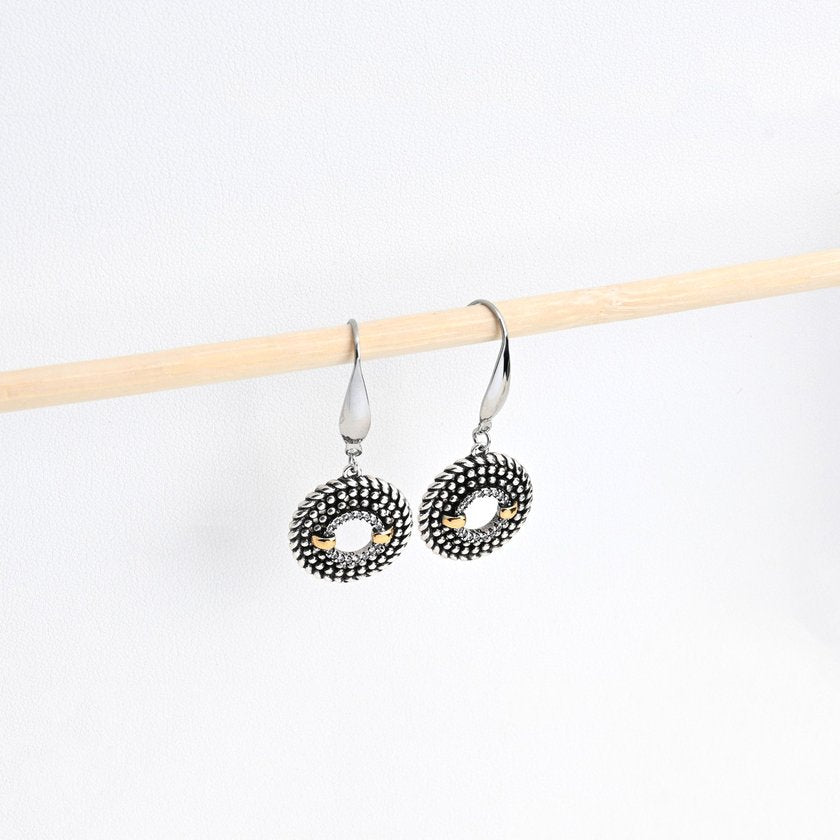 Brincos em aço bicolor com zircônias
